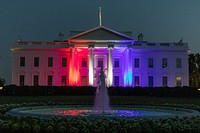 The White House is lit up in red, white and blue in honor of the U.S. Olympics Team USA competing in the Tokyo 2020 Paralympic Games on Friday, August 24, 2021, in Washington, D.C. Original public domain image from Flickr