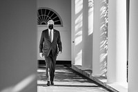 President Joe Biden walks along the Colonnade of the White House, Wednesday, Aug. 25, 2021, to the Oval Office. (Official White House Photo by Adam Schultz). Original public domain image from Flickr