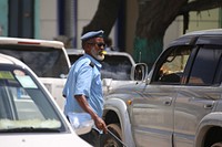 A traffic police at work in Kismayo, Somalia. Original public domain image from Flickr