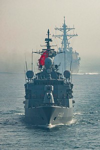 BLACK SEA. The Turkish Naval frigate TCG Yavuz (F 240) and the Arliegh Burke Guided class guided missile destroyer USS Porter (DDG 78) transit the Black Sea behind the Blue Ridge-class command and control ship USS Mount Whitney (LCC 20). Original public domain image from Flickr