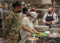 Culinary Team at CiTiboces Culinary Class December 2021 in Mexico, N.Y., December 7, 2021. Fort Drum culinary specialists recently won a cooking competition held by the 18th Airborne Corps. Original public domain image from Flickr