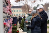 Sailors, midshipmen, U.S. Naval Academy alumni and family members participate in a Wreaths Across America event at the United States Naval Academy Cemetery in Annapolis, Md., December 10, 2021.  Original public domain image from Flickr