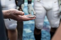 Coin toss before the Army-Navy football game. Original public domain image from Flickr
