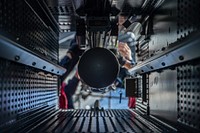 Sailors load an Evolved Sea Sparrow Missile into a NATO Sea Sparrow Missile System on a weather deck aboard the Nimitz-class aircraft carrier USS Harry S. Truman (CVN 75). 