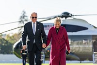 President Joe Biden and First Lady Jill Biden disembark Marine One and walk across the South Lawn of the White House, Monday, November 8, 2021, after their trip to Rehoboth Beach, Delaware. (Official White House Photo by Adam Schultz) This official White House photograph is being made available only for publication by news organizations and/or for personal use printing by the subject(s) of the photograph. The photograph may not be manipulated in any way and may not be used in commercial or political materials, advertisements, emails, products, promotions that in any way suggests approval or endorsement of the President, the First Family, or the White House.