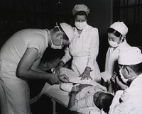 Bandaging an amputee at the Severance Hospital, Seoul, Korea 