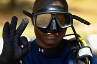 MOMBASA, Kenya (Feb. 16, 2022) Kenyan diver Anthony Macharia conducts pre-dive checks before dive training at exercise Cutlass Express 2022 in Mombasa, Kenya, Feb. 16, 2022. Cutlass Express 2022, sponsored by U.S. Africa Command and conducted by U.S. Naval Forces Africa, is designed to improve regional cooperation among participating nations in order to increase maritime safety and security in the East Africa regions. (U.S. Navy Photo by Chief Mass Communication Specialist Justin Stumberg)