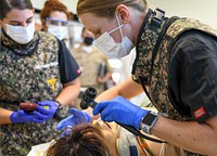 Naval Medical Center Camp Lejeune earns reverification as level III trauma center 220304-N-fe818-1001Naval Medical Center Camp has earned reverification as a Level III trauma Center by the American College of Surgeon's Committee on Trauma. Trauma team members participate in a trauma drill at NMCCL in September 202O. www.dvidshub.net/news/415813/naval-medical-center-camp-le...