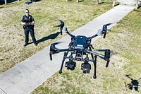 Greenville Police's Technology Officer A.F. Frasure demonstrates the department's DJI Matrice drone on Wednesday, March 2. Original public domain image from Flickr