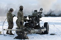 Spartan paratroopers conduct live-fire artillery trainingU.S. Army paratroopers assigned to Bravo Battery, 2nd Battalion, 377th Parachute Field Artillery Regiment, 4th Infantry Brigade Combat Team (Airborne), 25th Infantry Division, U.S. Army Alaska, fire the M119 105 mm howitzer during live-fire artillery training at Joint Base Elmendorf-Richardson, Alaska, March 16, 2022. The Soldiers of 4/25 belong to the only American airborne brigade in the Pacific and are trained to execute airborne maneuvers in extreme cold weather and high altitude environments in support of combat, partnership and disaster relief operations. (U.S. Air Force photo by Alejandro Peña)
