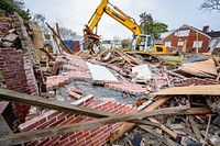 The City's Planning and Development Services Housing Division began demolishing a vacant house on Chestnut Street, March 23. Original public domain image from Flickr