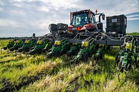 Alexander Frick, Jr. in his tractor, planter, planting soybean seeds with the aid of precision agriculture systems and information, April 13, 2021. Original public domain image from Flickr