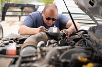 Taos, New Mexico. Wildland firefighters in Taos, New Mexcio conduct vehicle maintenance and safety checks. Photo by Avi Farber, BLM contract photographer. Original public domain image from Flickr