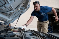 Taos, New Mexico. Wildland firefighters in Taos, New Mexcio conduct vehicle maintenance and safety checks. Photo by Avi Farber, BLM contract photographer. Original public domain image from Flickr