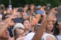 People taking photo with mobile phones, the United States Naval Academy. June 30, 2021 (U.S. Navy photo by Kenneth D. Aston Jr. Released). Original public domain image from Flickr