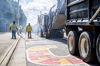 Crews begin removing asphalt along First Street at Town Common before repaving between Cotanche and Washington Streets, July 12, 2021. Original public domain image from Flickr