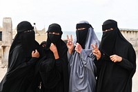 Somali women pose for a photo after Eid al-Adha prayers. AMISOM Photo/Fardosa Hussein. Hamar weyne, Mogadishu, Somalia, July 20, 2020. Original public domain image from Flickr