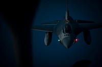 A U.S. Air Force F-16C Fighting Falcon with the 119th Fighter Squadron approaches a 141st Air Refueling Squadron KC-135R Stratotanker for refueling over the Atlantic Ocean. Original public domain image from Flickr