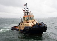  A Liberian tug boat approaches the Expeditionary Sea Base. Original public domain image from Flickr