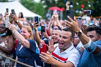 Frontline workers and military families cheer for President Joe Biden during the Fourth of July celebration, Sunday, July 4, 2021, on the South Lawn of the White House. (Official White House Photo by Chandler West). Original public domain image from Flickr