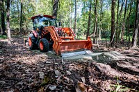 Parks Maintenance staff prepare Wildwood Park's trails for Halloween programs on October 12, 2022. Original public domain image from Flickr