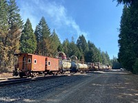 Fire Train Div W, Cedar Creek FireA fire train positioned on division W on the Cedar Creek Fire. Credit:Fire Train wetting fire line in Div W Willamette National ForestU.S. Forest Service