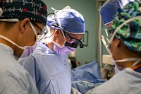 USNS Comfort Medical Teams Perform Surgeries Aboard the Ship 221030-N-YD864-1016PUERTO BARRIOS, Guatemala (Oct. 30, 2022) Cmdr. Tamara Kemp, center, performs a hand surgery aboard the hospital ship USNS Comfort (T-AH 20), Oct. 30, 2022. Comfort is deployed to U.S. 4th Fleet in support of Continuing Promise 2022, a humanitarian assistance and goodwill mission conducting direct medical care, expeditionary veterinary care, and subject matter expert exchanges with five partner nations in the Caribbean, Central and South America. (U.S. Navy photo by Mass Communication Specialist 2nd Class Juel Foster)