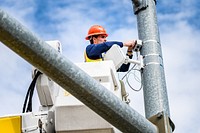 Greenville Engineering staff install radar-based detectors to improve signal changes at Fire Tower Rd and Ashcroft Dr on Wednesday, November 2. Original public domain image from Flickr