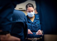 USNS Mercy (T-AH 19) Medical Personnel Train During MERCEX 22-1.211111-N-DA693-1003PACIFIC OCEAN (Nov. 11, 2021) Lt. Cmdr. Ashley Zander, a cardiothoracic surgeon assigned to the embarked Medical Treatment Facility (MTF) aboard Military Sealift Command (MSC) hospital ship USNS Mercy (T-AH 19), demonstrates central catheter line insertion during Mercy Exercise (MERCEX) 22-1 Nov. 11. MERCEX 22-1 is a three-week-long pierside and underway training evolution that highlights integration, training and camaraderie between MSC civilian mariners and MTF Sailors. USNS Mercy (T-AH 19) can steam to assist anywhere to provide relief as a symbol of Navy Medicine’s abilities around the world, and must be in a five-day-activation status in order to support missions over the horizon, and be ready, reliable and resilient to support mission commanders. (U.S. Navy photo by Mass Communication Specialist 2nd Class Jake Greenberg)