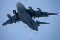 Air Force and Army conduct joint airborne operations at JBERU.S. Army paratroopers assigned to the 2nd Battalion, 377th Parachute Field Artillery Regiment, 2nd Infantry Brigade Combat Team (Airborne), 11th Airborne Division, “Arctic Angels,” jump from a U.S. Air Force C-17 Globemaster III during joint airborne training over Malemute Drop Zone, Joint Base Elmendorf-Richardson, Alaska, Nov. 9, 2022. The aircrew and aircraft were assigned to the 62nd Airlift Wing out of Joint Base Lewis-McChord, Wash. The 2/11 IBCT (A) is the only airborne infantry brigade combat team in the Arctic and Pacific theaters, providing the combatant commander with the unique capability to project an expeditionary force by air. (U.S. Air Force photo by Alejandro Peña)