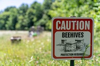 Caution beehives sign.