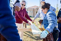 Students learn about subfloring and framing , Greenville, 2023. Original public domain image from Flickr