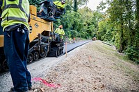 Greenway Construction (October 2021)Construction on the greenway extension from Pitt Street to Memorial Drive nears completion as workers apply pavement to the new trail.