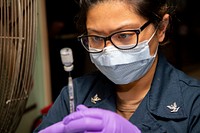 Mercy Sailors Receive COVID-19 Booster Shots 220506-N-NC885-1011Pacific Ocean (May 6, 2022) Hospital Corpsman 3rd Class Kathleen Tiscareno, from Bakersfield, California, prepares to give COVID-19 vaccine boosters to personnel aboard the Military Sealift Command hospital ship USNS Mercy (T-AH 19) while underway for Pacific Partnership 2022. Now, in its 17th year, Pacific Partnership is the largest annual multinational humanitarian assistance and disaster relief preparedness mission conducted in the Indo-Pacific. (U.S. Navy photo by Mass Communication Specialist 3rd Class Drace Wilson)