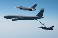 U.S. Air Force F-16 Fighting Falcons assigned to the South Carolina Air National Guard fly with a KC-135 Stratotanker assigned to the Alabama ANG for aerial refueling during Sentry Savannah 22-1, May 5, 2022. Sentry Savannah, an ANG near-peer threat training exercise, brought more than 60 aircraft from active duty, ANG and Air Reserve units to the Air Dominance Center for the exercise. (U.S. Air Force photo by Tech. Sgt. Betty R. Chevalier)