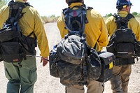 MAY 14: Fire packs and radios on firefightersYUMA, AZ - MAY 14: Fire packs and radios on wildland firefighters at the Mittry Lake Wildlife Area in Yuma, Arizona, in the Colorado River District on Saturday, May 14, 2022. Photo by Suzanne Allman, contract photographer for BLM