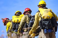 MAY 15 Firefighters practice attack on mock fireKINGMAN, AZ - MAY 15: Wildland firefighters from the Kingman district set out in a group to attack a mock fire in the desert east of Kingman, Arizona. The exercise was part of the 2022 Arizona Fire Preparedness Review in Kingman, Arizona on Sunday, May 15, 2022. Photo by Suzanne Allman, contract photographer for BLM