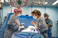 Pacific Partnership 2022 Conducts Surgical Operations Aboard USNS Mercy 220624-N-YL073-1306VUNG RO BAY, Vietnam (June 24, 2022) – Cmdr. Stephanie Bedzis, right, from Guam, and Lt. Cmdr. Carolyn Gosztyla, perform a laparoscopic surgery aboard Military Sealift Command hospital ship USNS Mercy (T-AH 19) during Pacific Partnership 2022 (PP22). Now in its 17th year, Pacific Partnership is the largest annual multinational humanitarian assistance and disaster relief preparedness mission conducted in the Indo-Pacific. (U.S. Navy photo by Mass Communication Specialist 1st Class Shamira Purifoy)