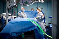 Pacific Partnership 2022 Conducts Surgical Operations Aboard USNS Mercy 220624-N-YL073-1375VUNG RO BAY, Vietnam (June 24, 2022) – Cmdr. Stephanie Bedzis, right, from Guam, and Lt. Cmdr. Carolyn Gosztyla, perform a laparoscopic surgery aboard Military Sealift Command hospital ship USNS Mercy (T-AH 19) during Pacific Partnership 2022 (PP22). Now in its 17th year, Pacific Partnership is the largest annual multinational humanitarian assistance and disaster relief preparedness mission conducted in the Indo-Pacific. (U.S. Navy photo by Mass Communication Specialist 1st Class Shamira Purifoy)