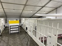 Detention pods as seen from a high angle in a newly constructed U.S. Customs and Border Protection soft-sided facility in Eagle Pass, Texas, July 12, 2022. The facility’s primary purpose is to safely and expeditiously process individuals in U.S. Border Patrol custody. CBP Photo by Dennis Smith