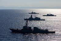 The Arleigh Burke-class guided-missile destroyer USS Bainbridge (DDG 96), the Italian Navy Carlo Bergamini-class frigate ITS Alpino (F 594), the French Navy Aquitaine-class frigate FS Languedoc (D 653), and the Arleigh Burke-class guided-missile destroyer USS Cole (DDG 67), participate in a maneuvering exercise in the Adriatic Sea, July 6, 2022.