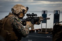 U.S. Marine Corps Lance Cpl. Dillon Siebert, a rifleman with Golf Company, Battalion Landing Team 2/6, 22nd Marine Expeditionary Unit (MEU), fires at targets during a live-fire range aboard the Wasp-class amphibious assault ship USS Kearsarge (LHD 3) in the Atlantic Ocean, July 15, 2022. The Kearsarge Amphibious Ready Group and 22nd MEU, under the command and control of Task Force 61/2, is on a scheduled deployment in the U.S. Naval Forces Europe area of operations, employed by U.S. Sixth Fleet to defend U.S., allied and partner interests. (U.S. Marine Corps photo by Sgt. Armando Elizalde)