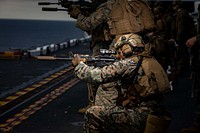 U.S. Marine Corps Staff Sgt. Seth Wakefield, a squad leader with Golf Company, Battalion Landing Team 2/6, 22nd Marine Expeditionary Unit (MEU), engages targets during a live-fire range aboard the Wasp-class amphibious assault ship USS Kearsarge (LHD 3) in the Atlantic Ocean, July 15, 2022. The Kearsarge Amphibious Ready Group and 22nd MEU, under the command and control of Task Force 61/2, is on a scheduled deployment in the U.S. Naval Forces Europe area of operations, employed by U.S. Sixth Fleet to defend U.S., allied and partner interests. (U.S. Marine Corps photo by Sgt. Armando Elizalde)