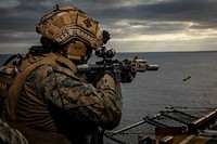 U.S. Marine Corps Staff Sgt. Paul Kainz, a squad leader with Golf Company, Battalion Landing Team 2/6, 22nd Marine Expeditionary Unit (MEU), fires at targets during a live-fire range aboard the Wasp-class amphibious assault ship USS Kearsarge (LHD 3) in the Atlantic Ocean, July 15, 2022. The Kearsarge Amphibious Ready Group and 22nd MEU, under the command and control of Task Force 61/2, is on a scheduled deployment in the U.S. Naval Forces Europe area of operations, employed by U.S. Sixth Fleet to defend U.S., allied and partner interests. (U.S. Marine Corps photo by Sgt. Armando Elizalde)