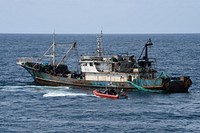 The Over the Horizon (OTH) cutter boat crew assigned to the Famous-class medium endurance cutter USCGC Mohawk (WMEC 913) conducts boarding on a fishing vessel in the Atlantic Ocean.