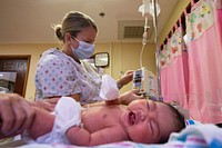 Pacific Partnership 2022 Medical Personnel Provide Pediatric Medical Care 220715-N-NC885-1031KOROR, Palau (July 15, 2022) – Lt. Cdr. Jennifer Motzkus, from Aiken, South Carolina, performs a pediatric exam on an infant at the Belau National Hospital in Palau during Pacific Partnership 2022. Now in its 17th year, Pacific Partnership is the largest annual multinational humanitarian assistance and disaster relief preparedness mission conducted in the Indo-Pacific. (U.S. Navy photo by Mass Communication Specialist 2nd Class Drace Wilson)