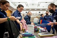 DHS and USCG Backpack DriveWashington, D.C. (August 17, 2022) U.S. Coast Guard and Department of Homeland Security personnel participate in a local back-to-school backpack drive, donating school supplies to children in the Washington D.C. area. (DHS Photo by Benjamin Applebaum)