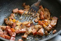 Frying bacons and onions.