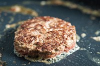 Cooked hamburger patty.