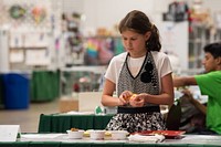 Young men and women, age 8 to 11, compete in the Top Chef competition during the 2022 Maryland State Fair in Timonium, Sept. 4, 2022. 8 to 10 age category had to create a healthy snack while the 11-13 age category had to cook a healthy breakfast. The theme for this year was "Healthy Living challenge." The Maryland State Fair provides 4-H youth an opportunity to showcase all of what they've learned through their club, school, camp, and other 4-H experiences. Youth develop life skills while learning about everything from animal science to rocketry, public speaking, and the arts. There's something for everyone in 4-H. The state fair also allows youth to engage with the community and build lifelong friendships. (USDA photo by Christophe Paul)